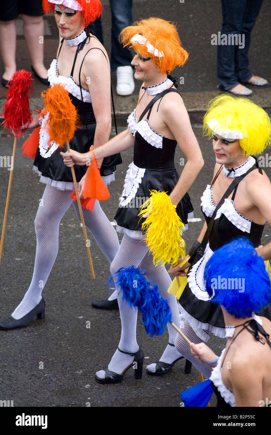 Drag queen transvestites march along the road in Brighton's Gay Pride parade Stock Photo