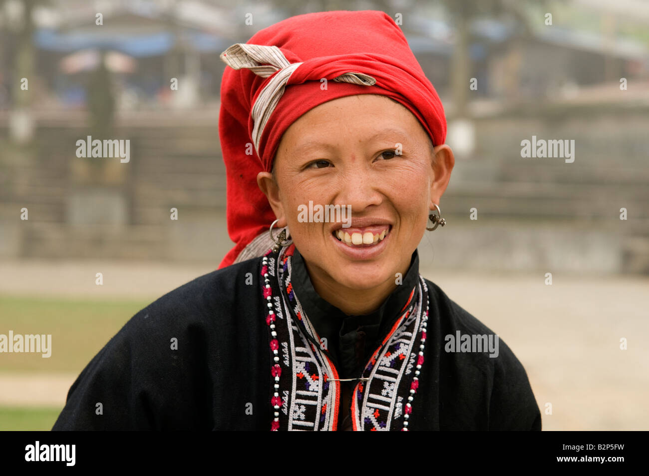 Portrait of Red Dao tribal girl wearing traditional costume in Sapa Vietnam Stock Photo