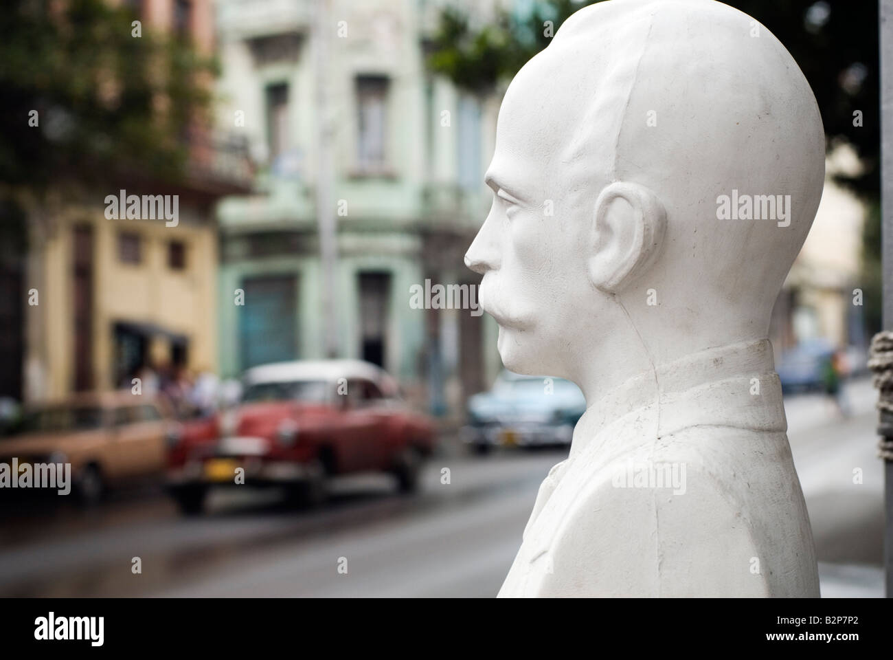 Bust of Jose Marti beside the road in central Havana during time of embargo in Cuba Havana Cuba Stock Photo