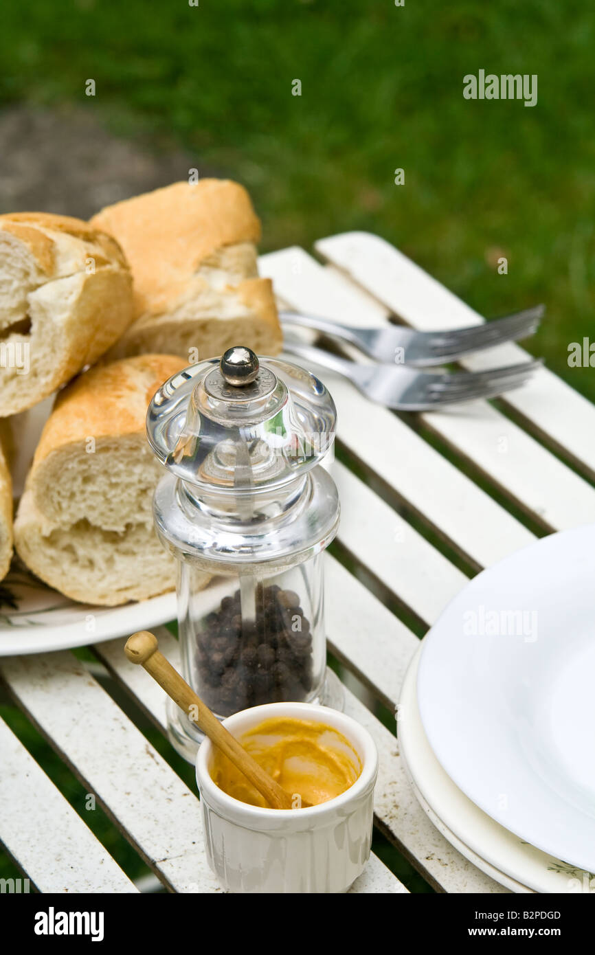 A plate of french bread and condiments, UK. Stock Photo