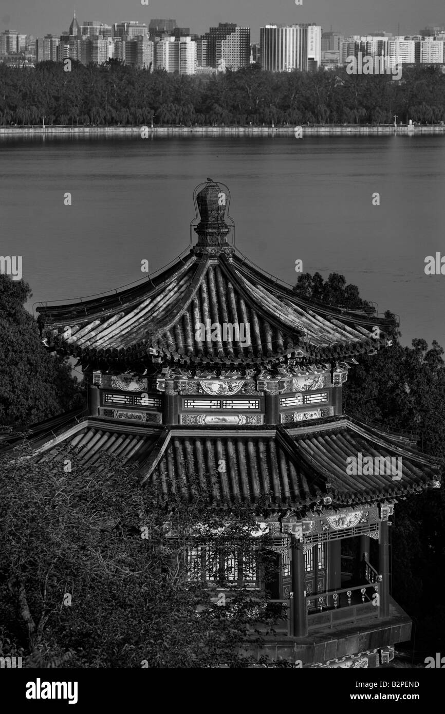 A view from the summer palace, beijing, huge contrast between old temples and new commercial city center. Stock Photo