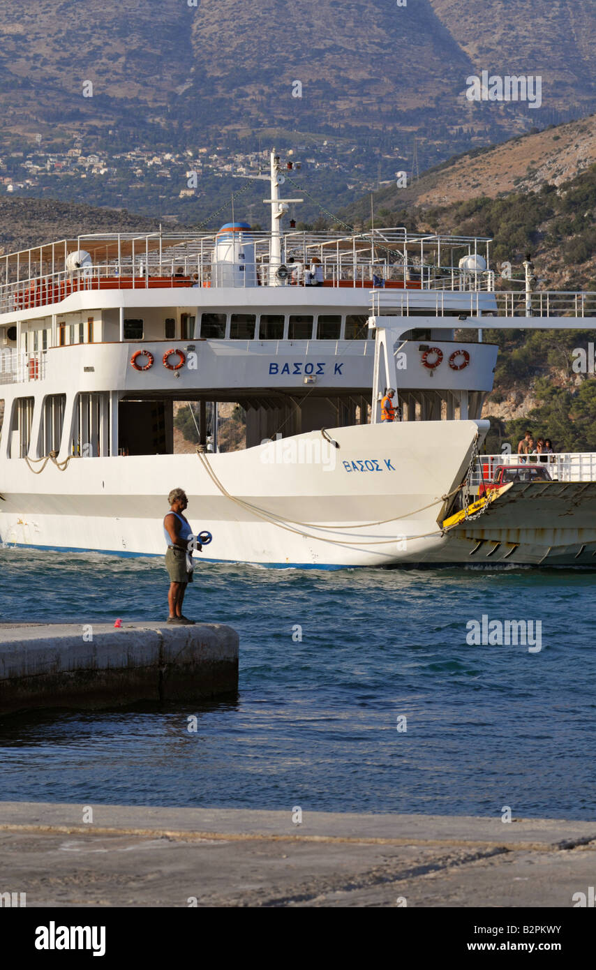 Looking across Argostoli bay with the Lixouri ferry arriving at Argostoli quay Kefalonia Greece Stock Photo