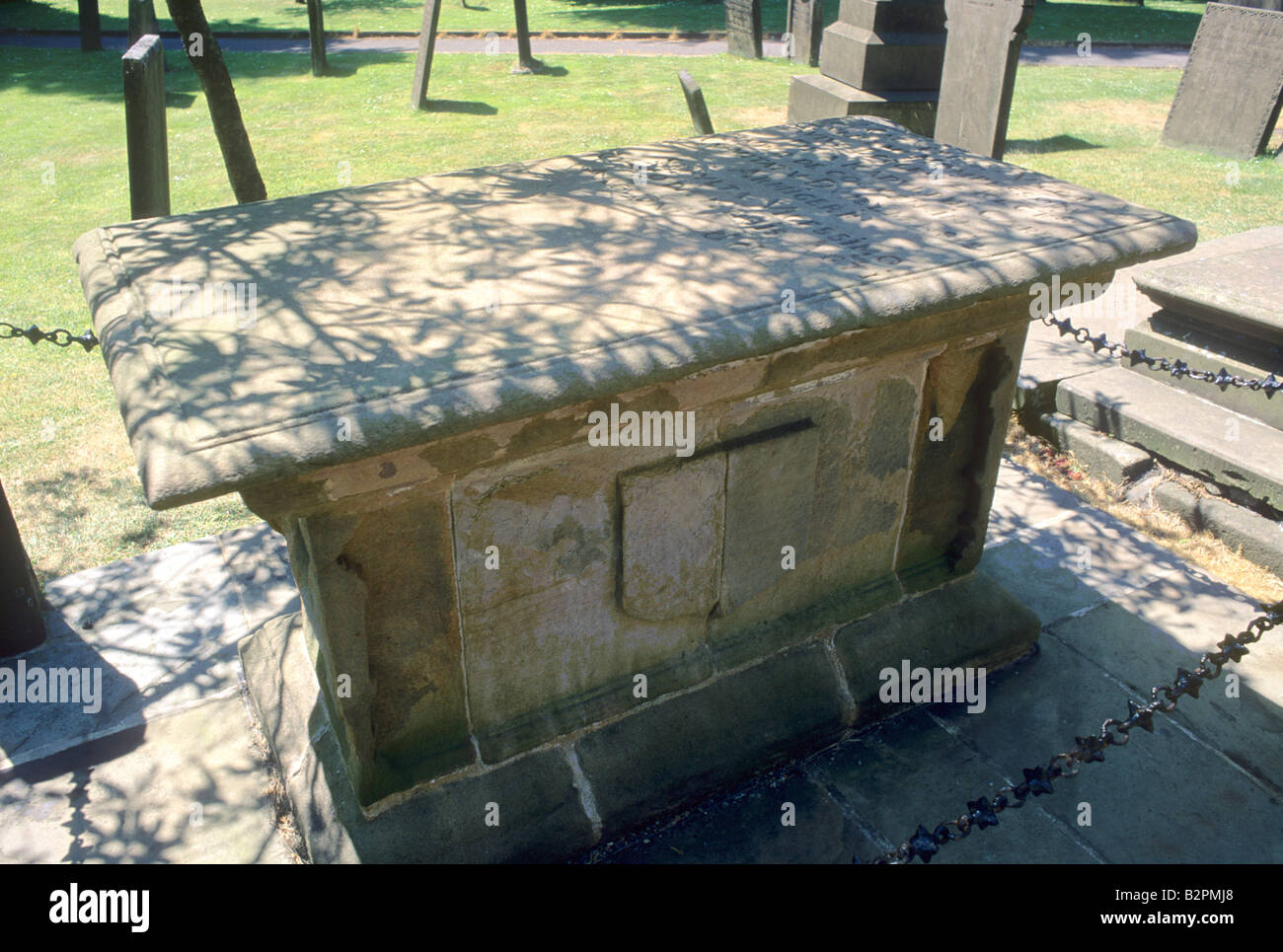 Plague victims tomb Eyam churchyard Derbyshire England UK grave Peak