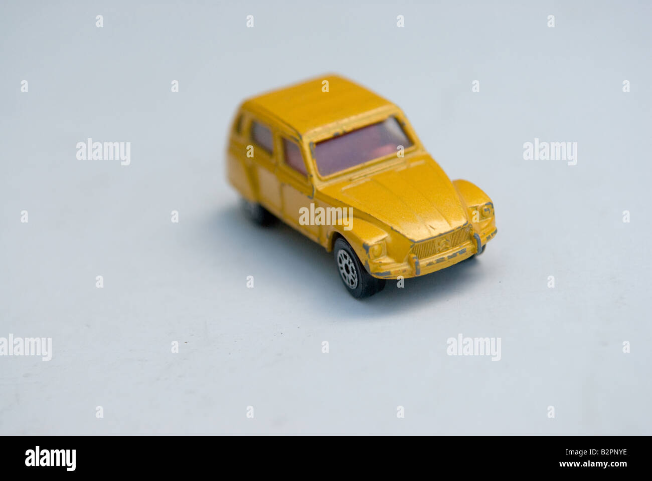 model yellow citroen toy car on white background Stock Photo