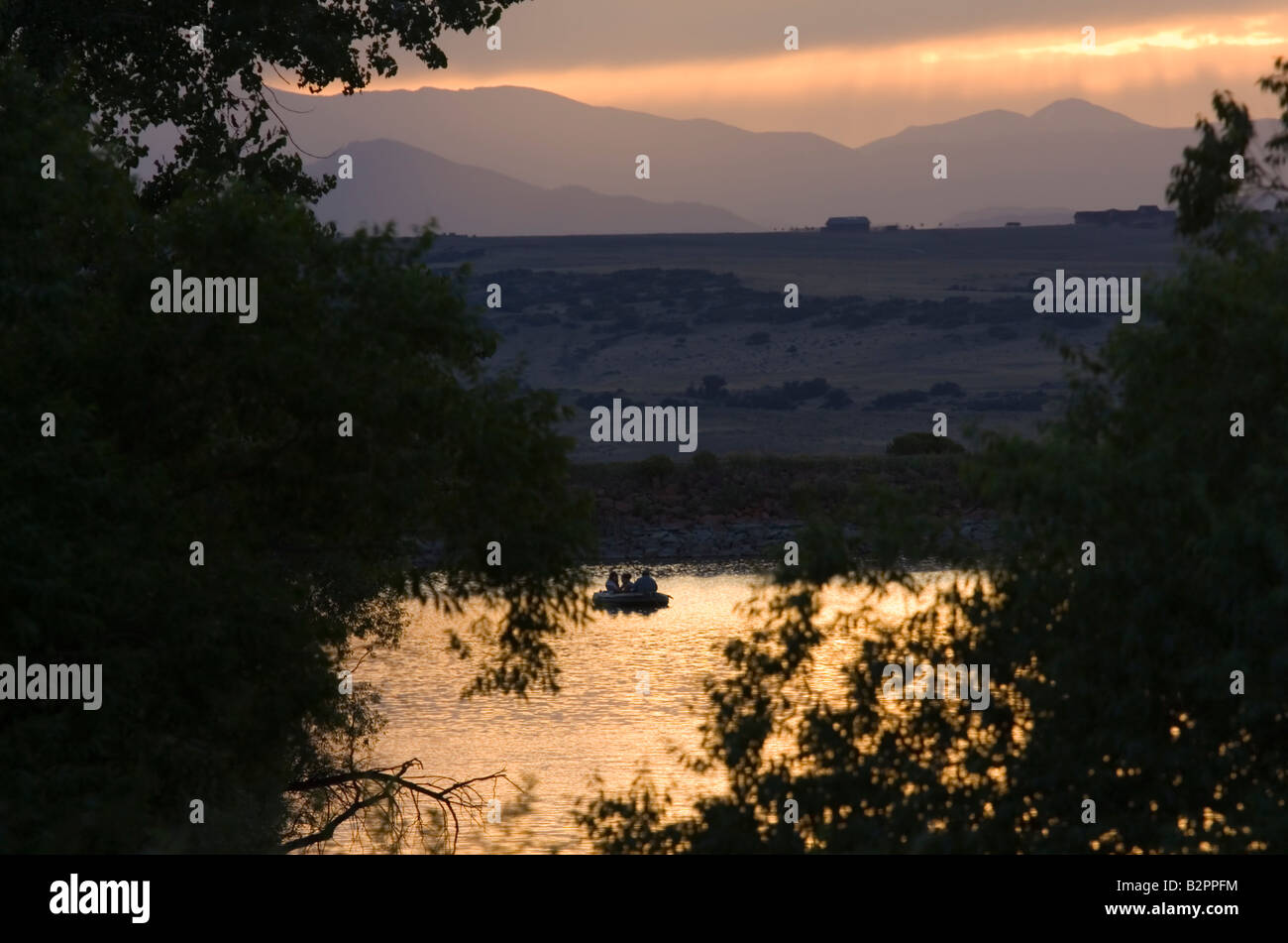Fishing Boat Sunset Stock Photo - Alamy