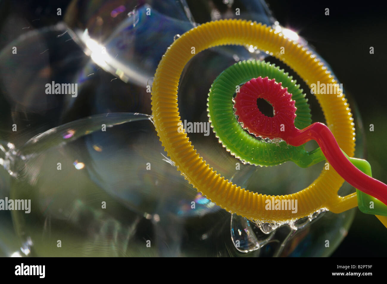 Bubble wand with bubbles close up Stock Photo Alamy