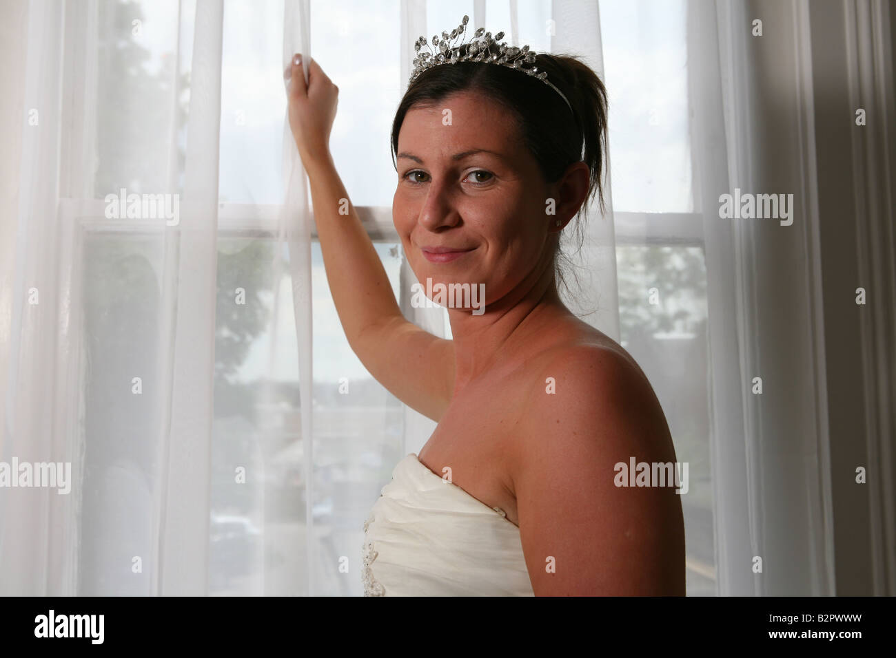 A Portrait Of A Beautiful Woman Modelling A Wedding Dress Used In