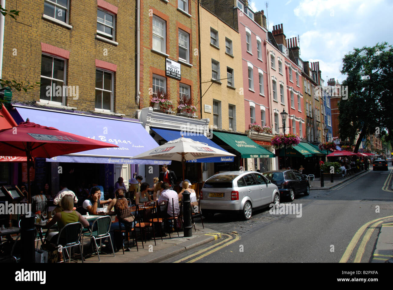 View of colourful cafes in James Street near St Christpher's Place London England Stock Photo