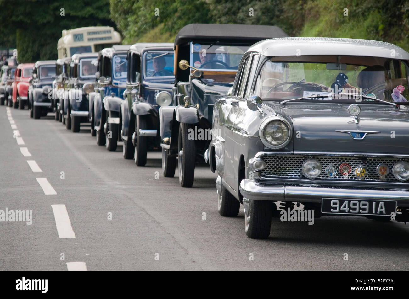 F-series Vauxhall Victor (1957=1961) leads a row of classic cars. Stock Photo
