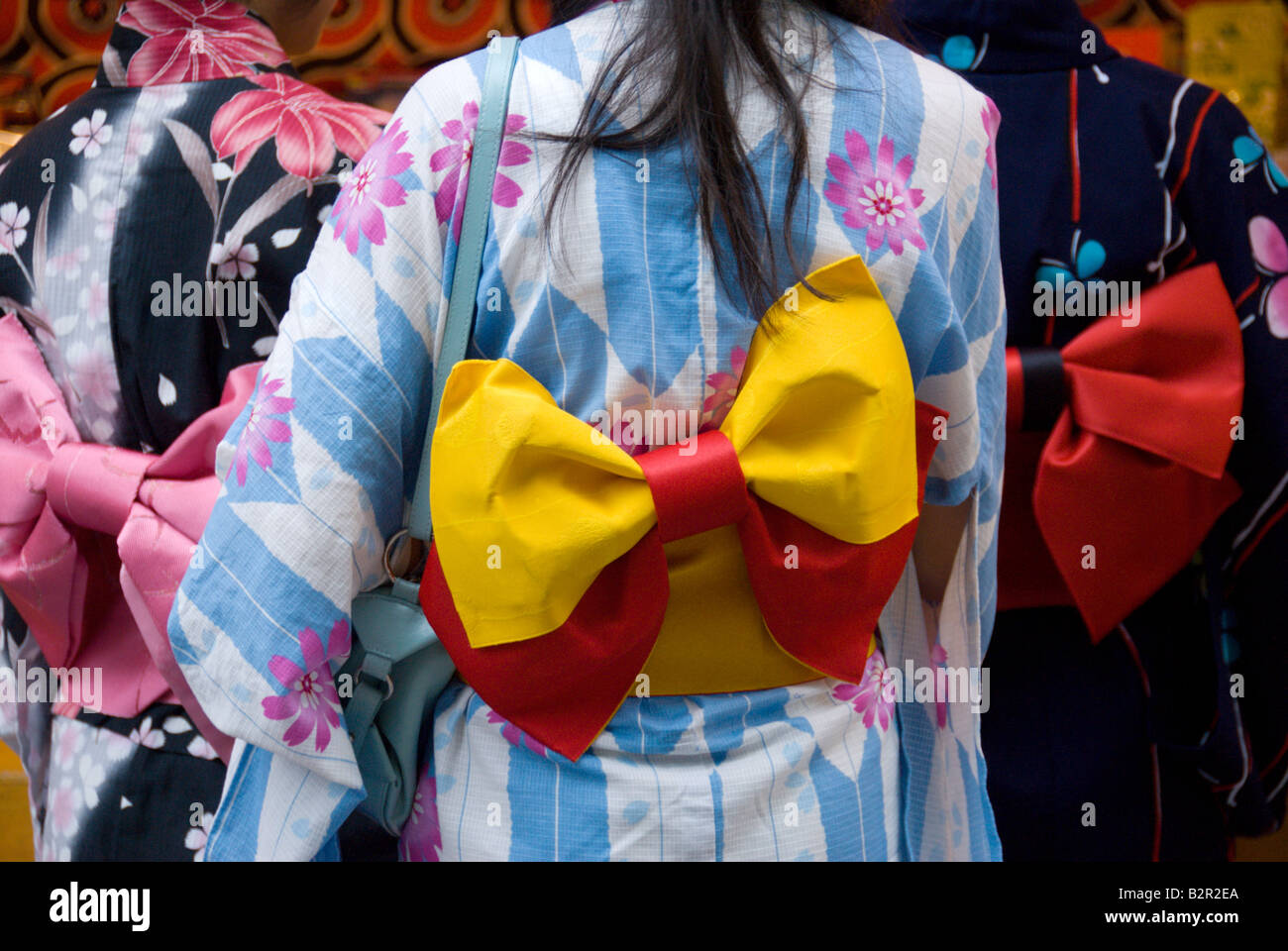 Teenage girls in traditional summer kimono or yukata with colourful obi belts, Shimosuwa, Nagano, Japan Stock Photo