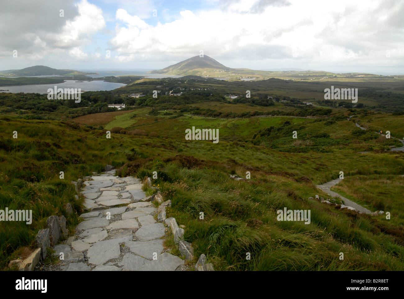 Hiking path in the Connemara National Park with the view down to the bay (Ballynakill Harbour). Stock Photo