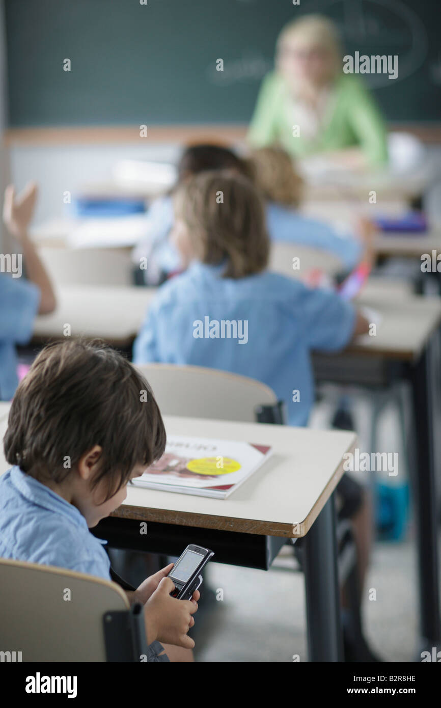 School girl texting uniform hi-res stock photography and images - Alamy