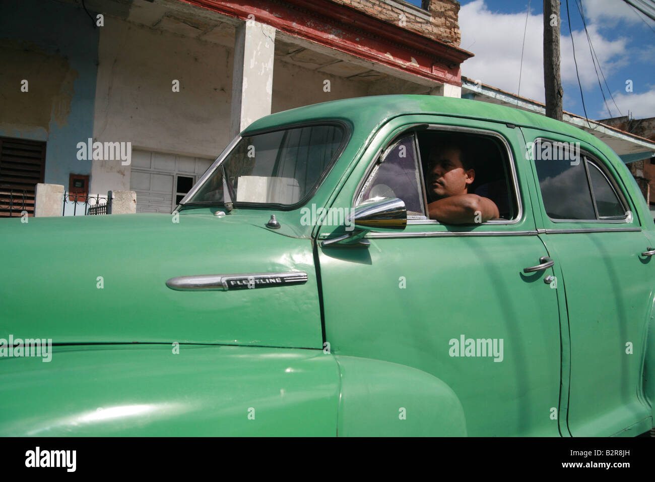 vintage-car-in-a-street-of-vinales-pinar-del-r-o-province-cuba-latin