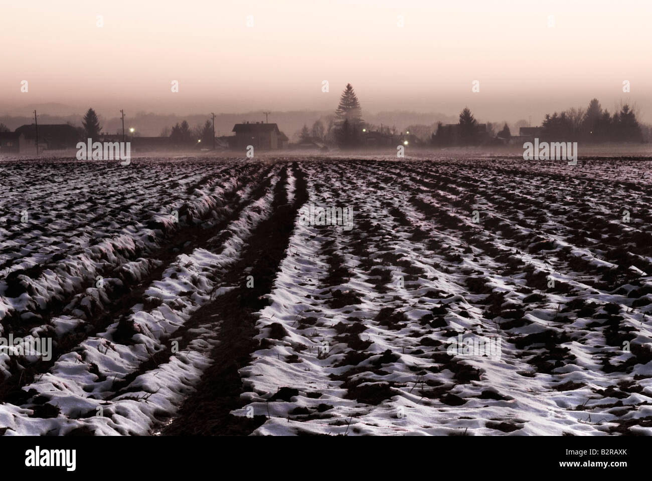 Frozen farmers field in the town of dolga vas hires stock photography