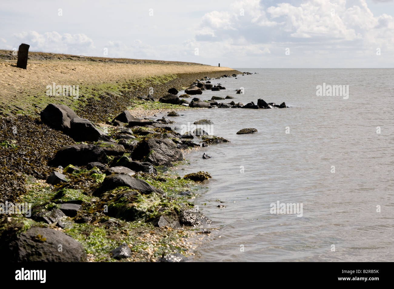 Ameland dike with sea Stock Photo