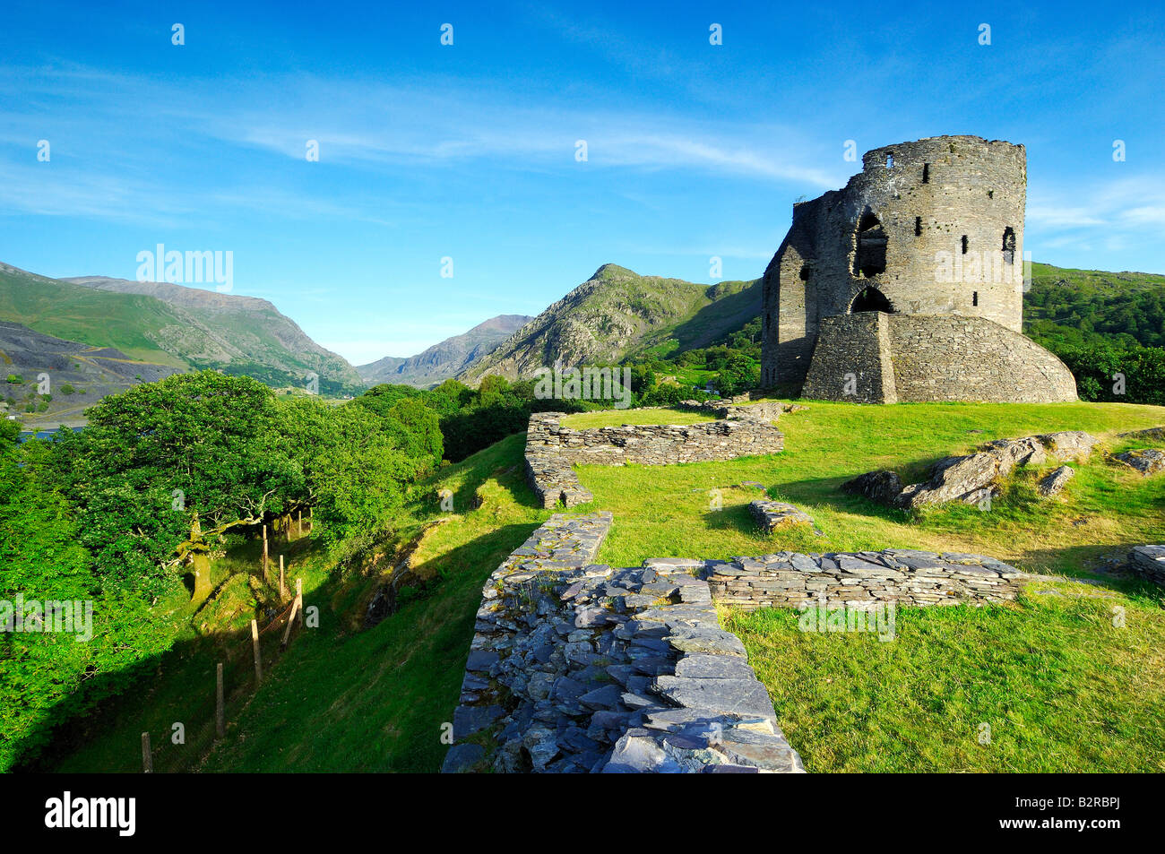 The derelict keep of Dolbadarn Castle on the banks of Llyn Padarn near Llanberis in Snowdonia national park North Wales Stock Photo