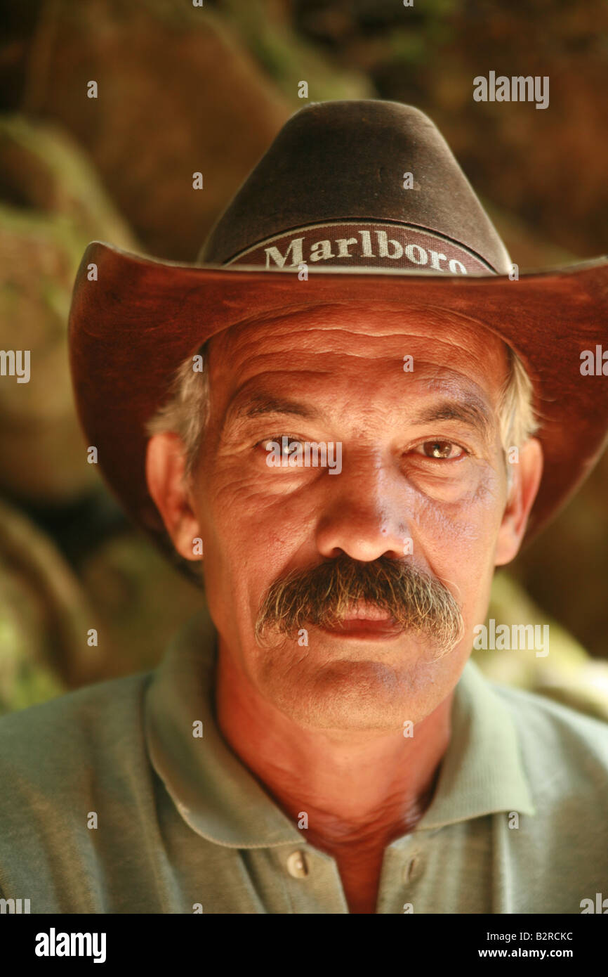 Cuban man wearing a Marlboro cowboy hat Vinales Pinar del Río Province Cuba Latin America Stock Photo