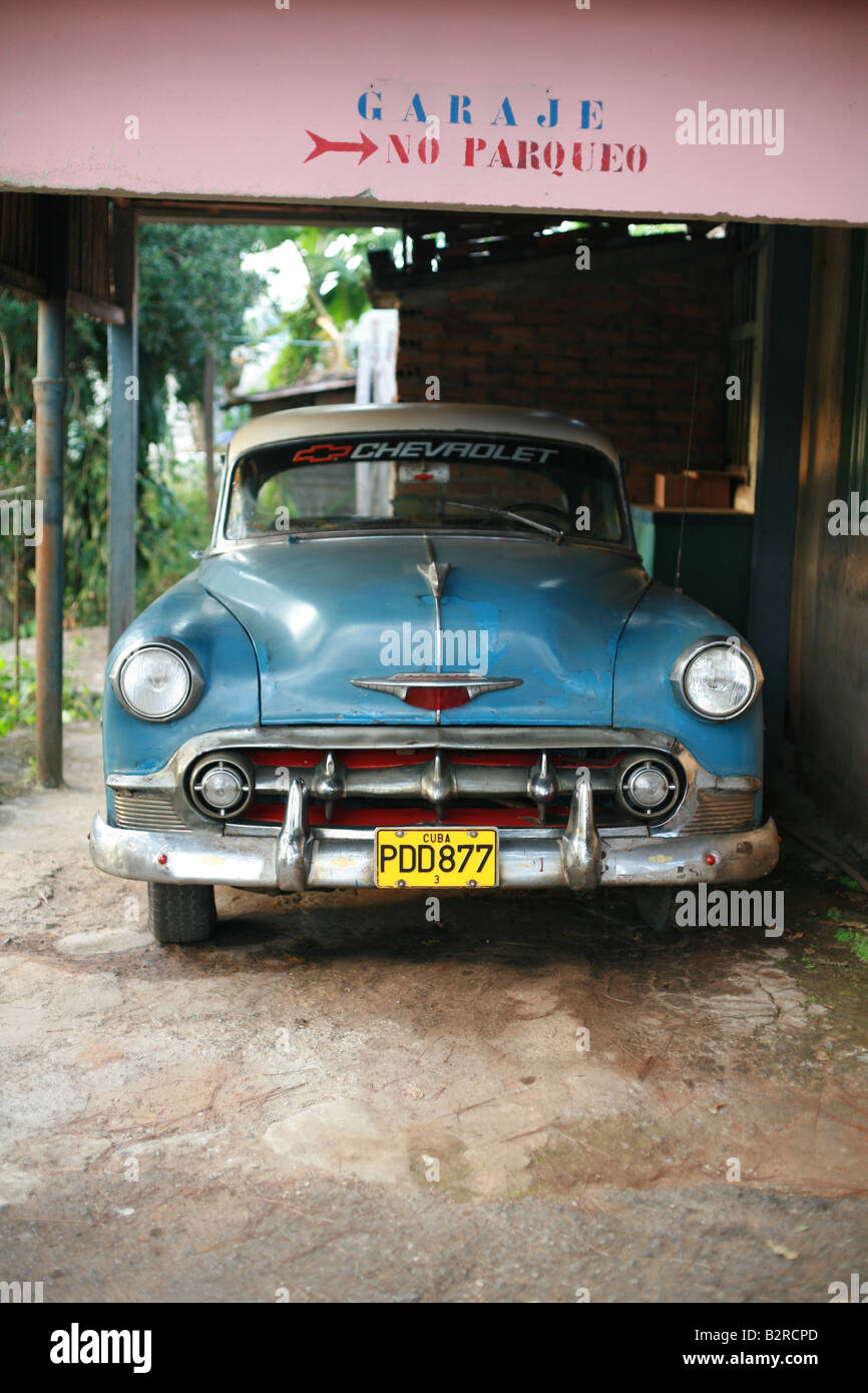 Vintage car in a garage in Vinales Pinar del Río Province Cuba Latin America Stock Photo