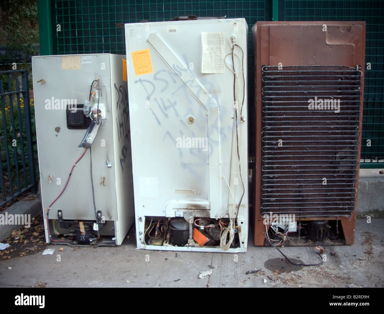 Discarded refrigerators await pick up and proper disposal by the Department of Sanitation in New York Stock Photo