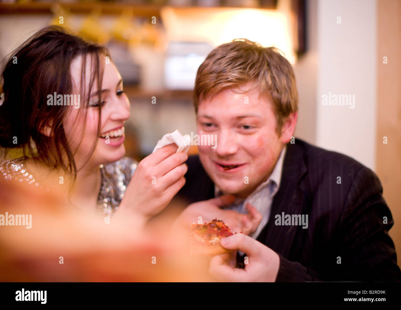 A group of young adults enjoy themselves at a party at home in London United Kingdom Stock Photo