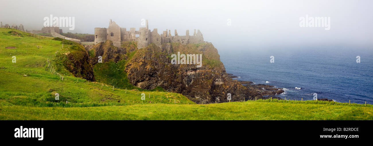Dunluce Castle on a misty morning on the Antrim Coast Northen Ireland UK Stock Photo