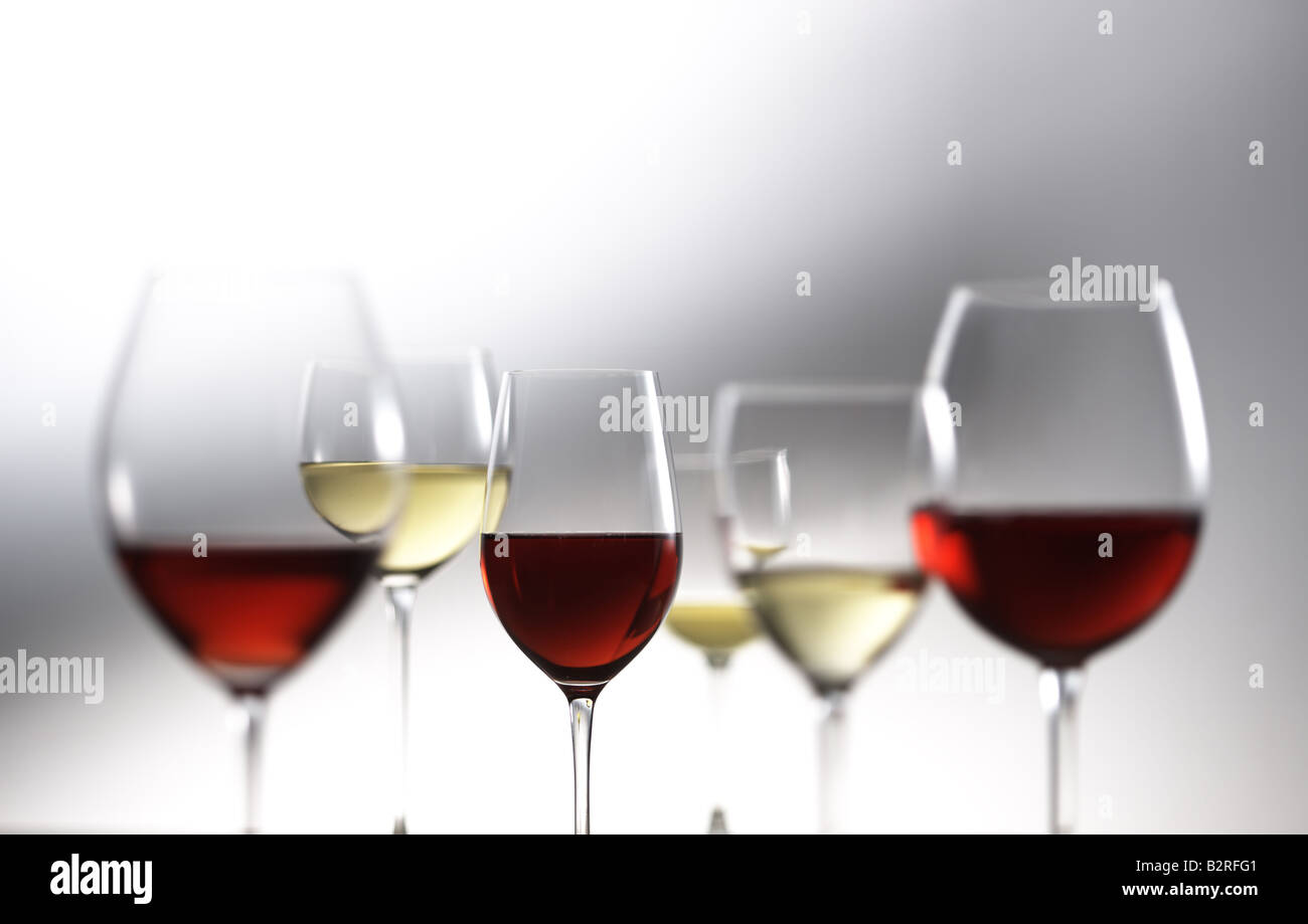 Red and white wine glasses soft focus background Stock Photo