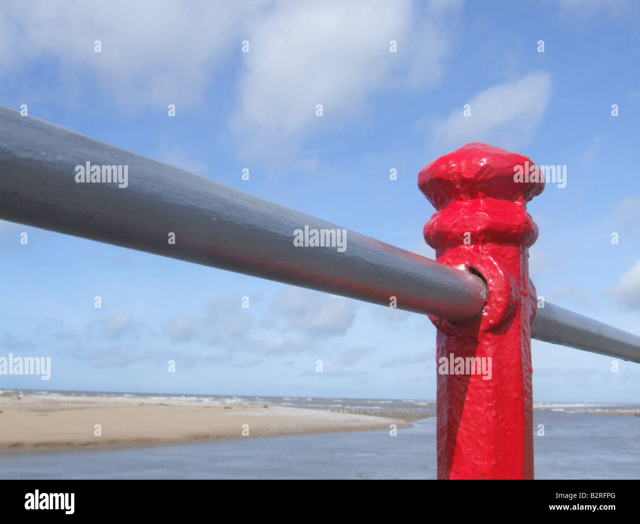Red Factor Railing red railings on walk way path by sea Stock Photo - Alamy