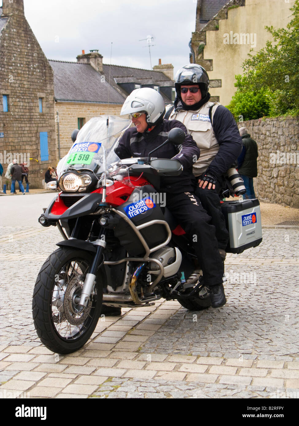 Press photographer pillion on a motorcycle at the Tour de France 2008 Stock Photo