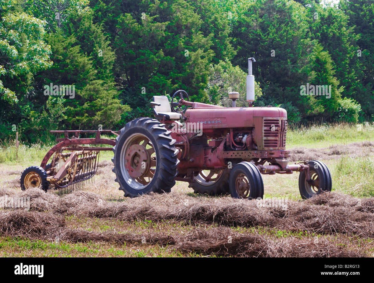 Tractor in a field Stock Photo - Alamy