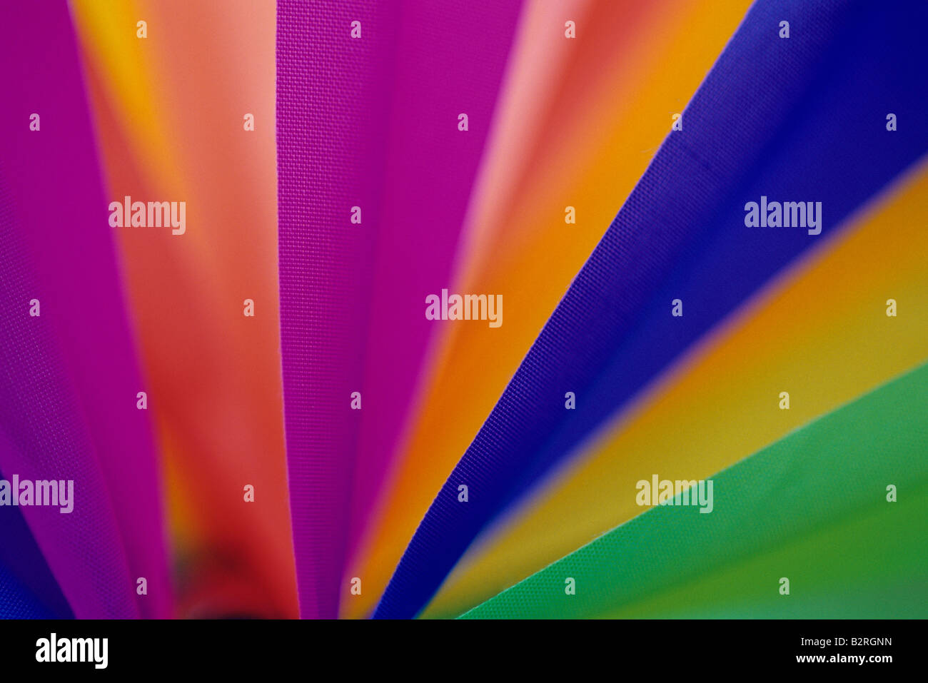 Multi colored close up of a pinwheel Stock Photo - Alamy
