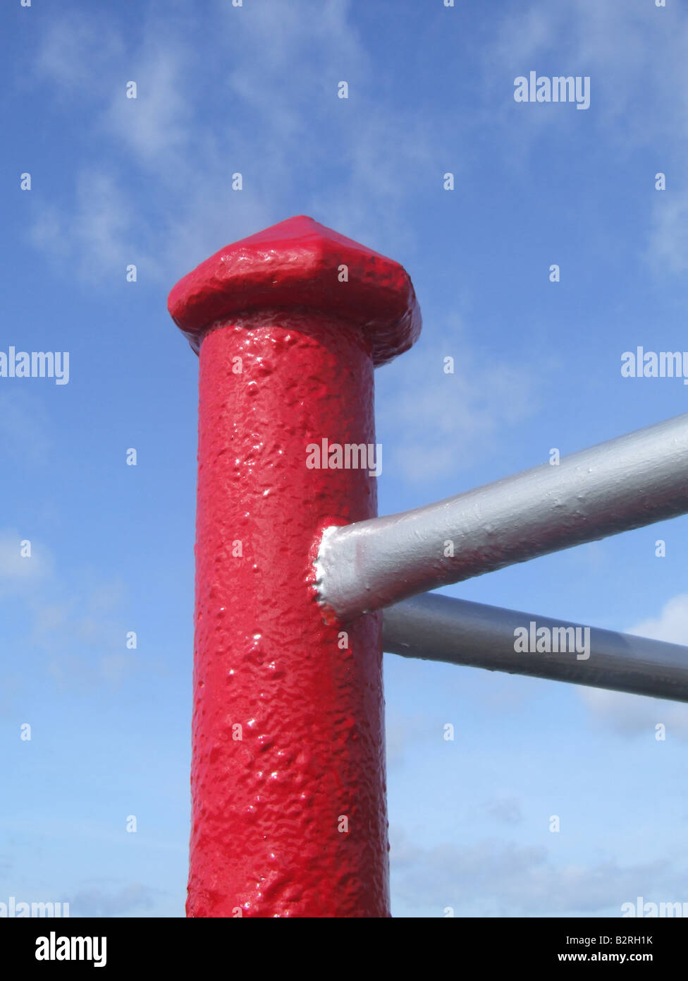 Red Factor Railing red railings on walk way path by sea Stock Photo - Alamy