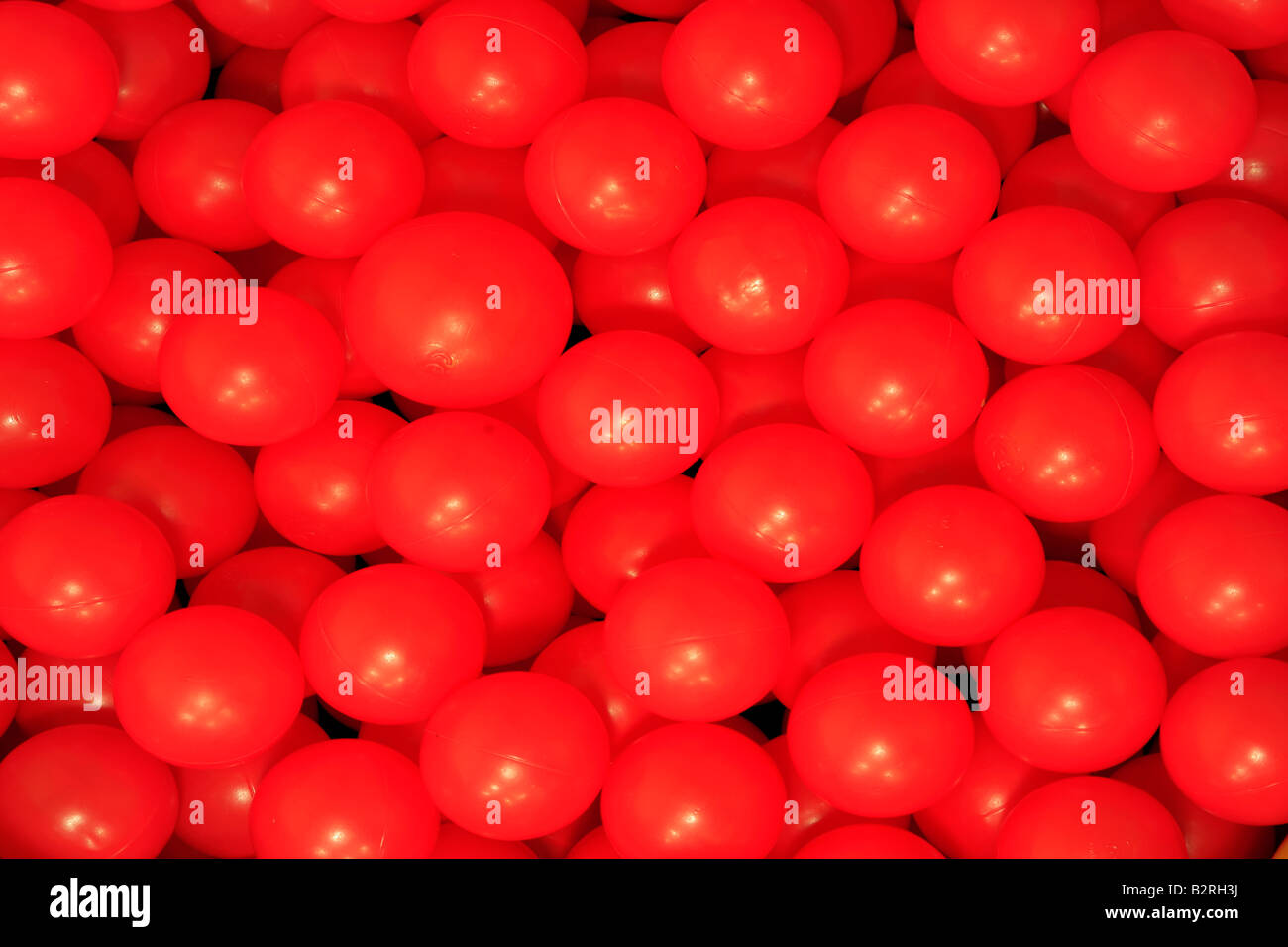 Plastic balls in a ballpond red play balls childsplay together groups