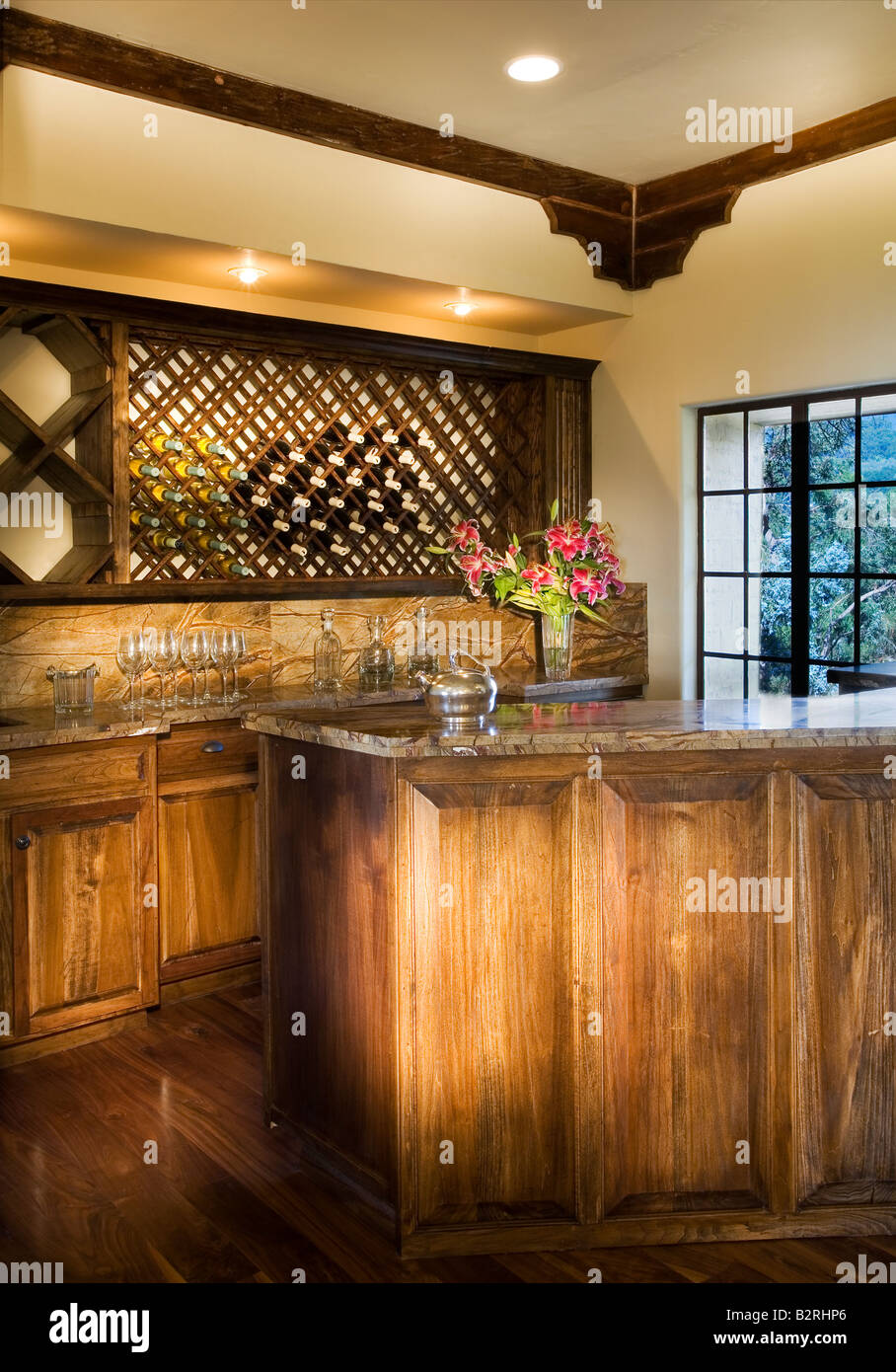 Old wet bar with wood paneling and wine rack Stock Photo Alamy