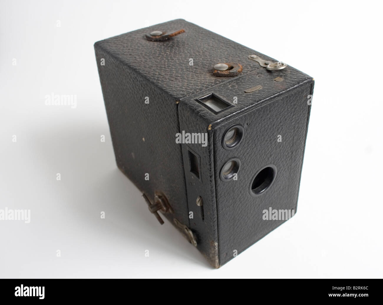 Old fashion film box camera in black leather casing from side and semi  front view shot on white background Stock Photo - Alamy