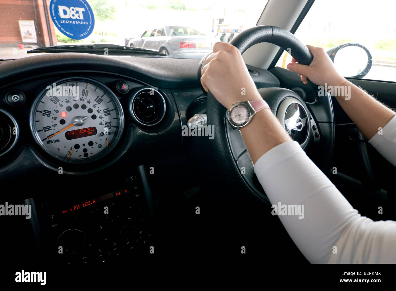 hand on car control steering wheel Stock Photo Alamy
