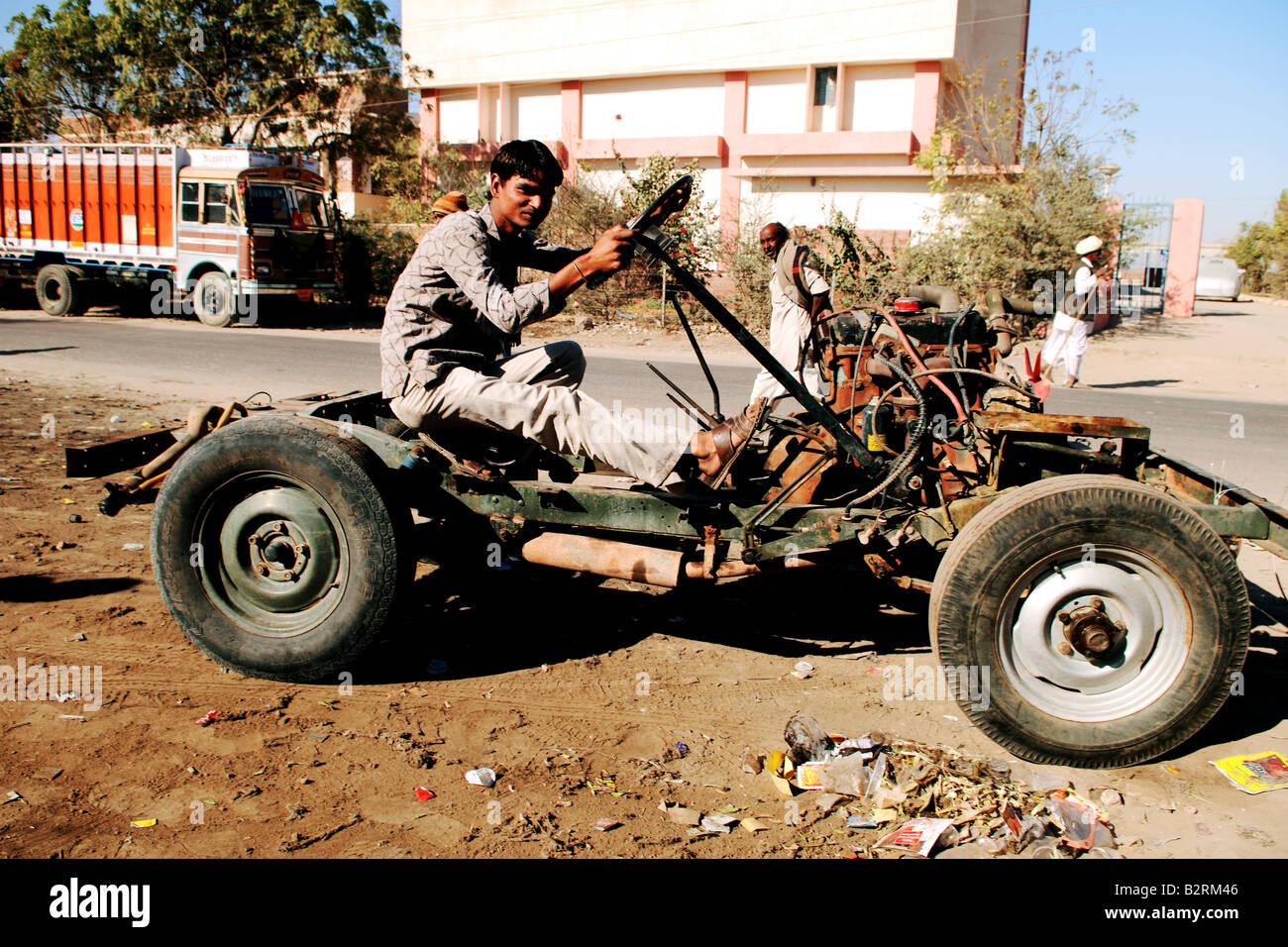 Formula One or maybe not A very old car on the dusty roads of Rajasthan India Stock Photo