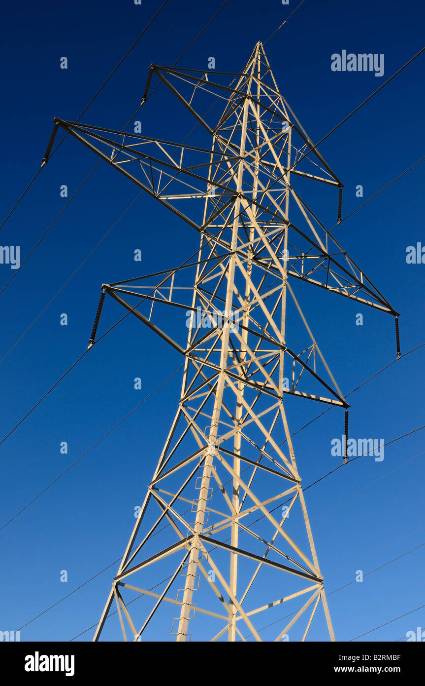 Steel frame hydro tower and electricity transmission high tension wires against a blue sky Toronto Stock Photo