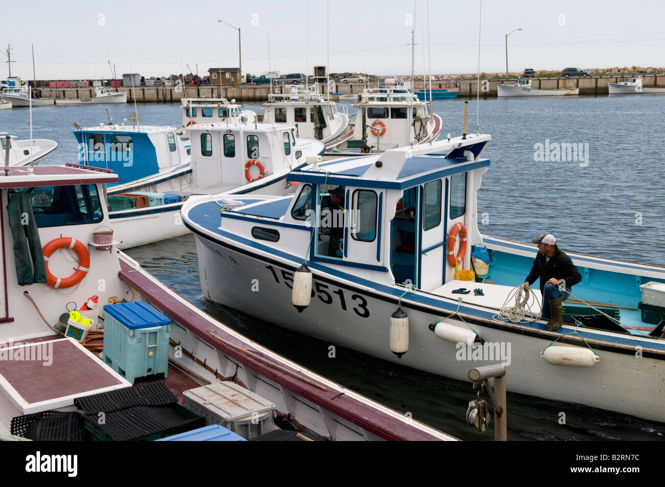 Escuminac Wharf with fishing boats in New Brunswick Stock Photo