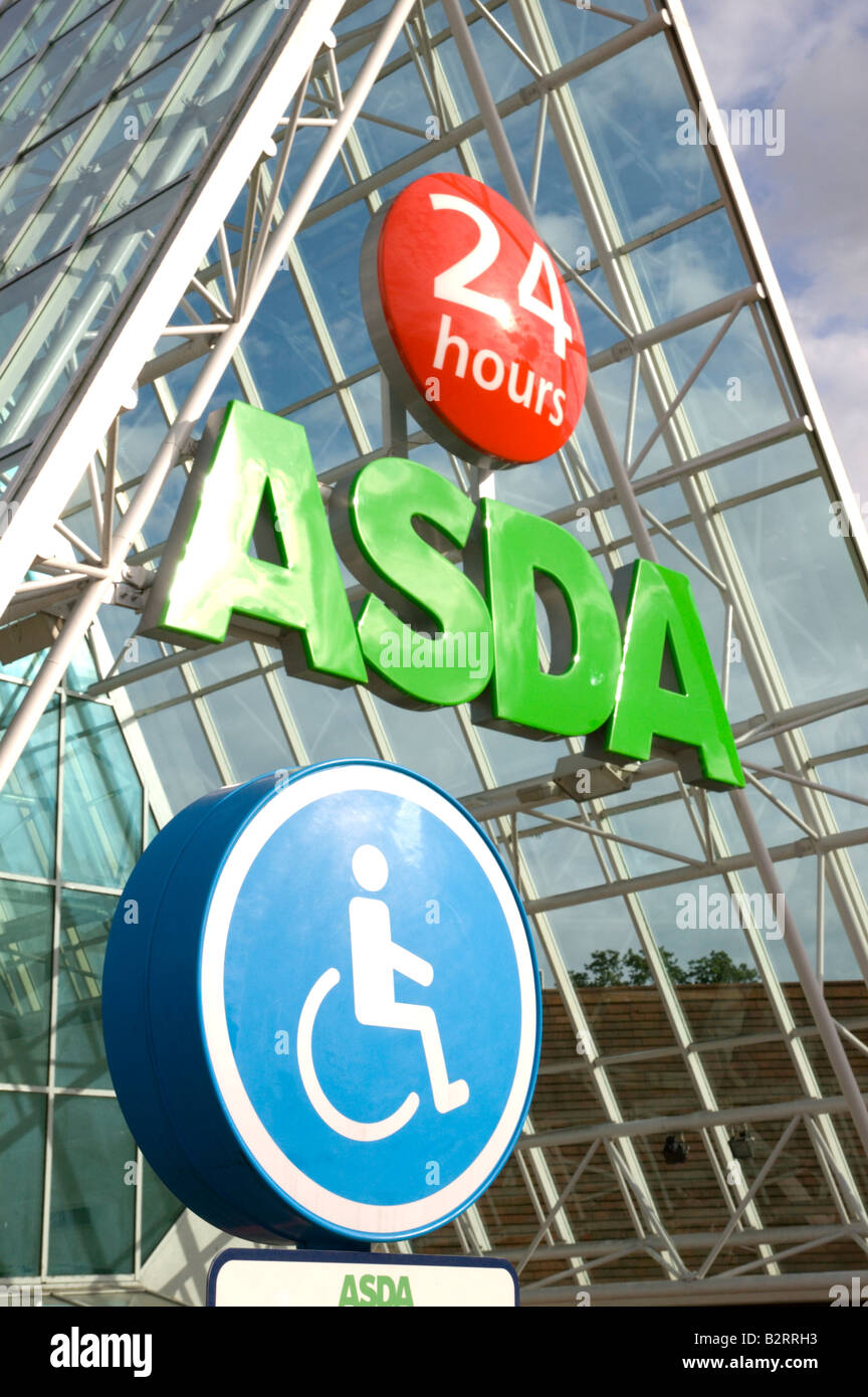 Asda 24 hour superstore atrium, Lower Earley, Reading, Berkshire, UK, showing disabled parking sign in foreground Stock Photo