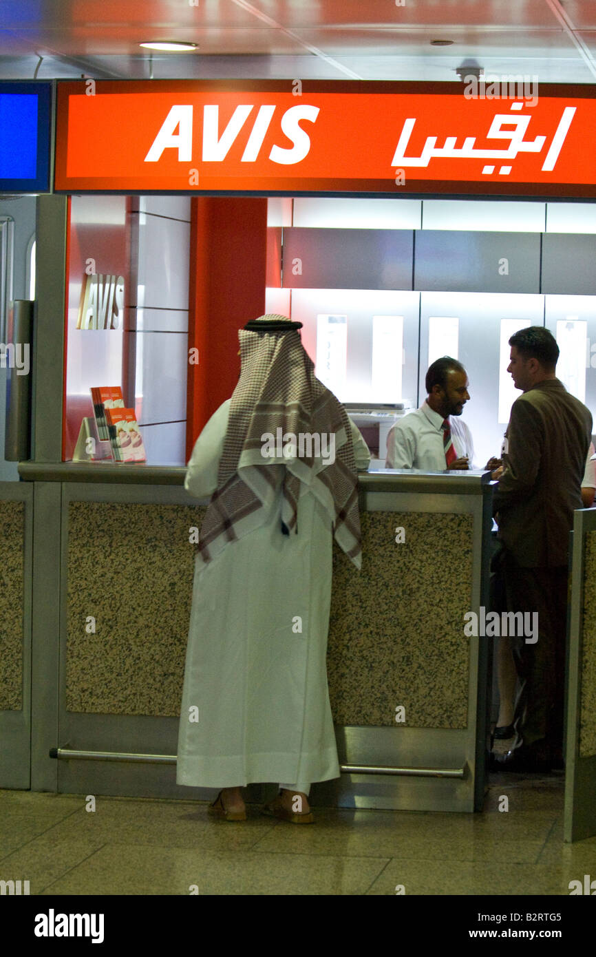 Arab Man Renting a Car in Dubai Airport UAE Stock Photo
