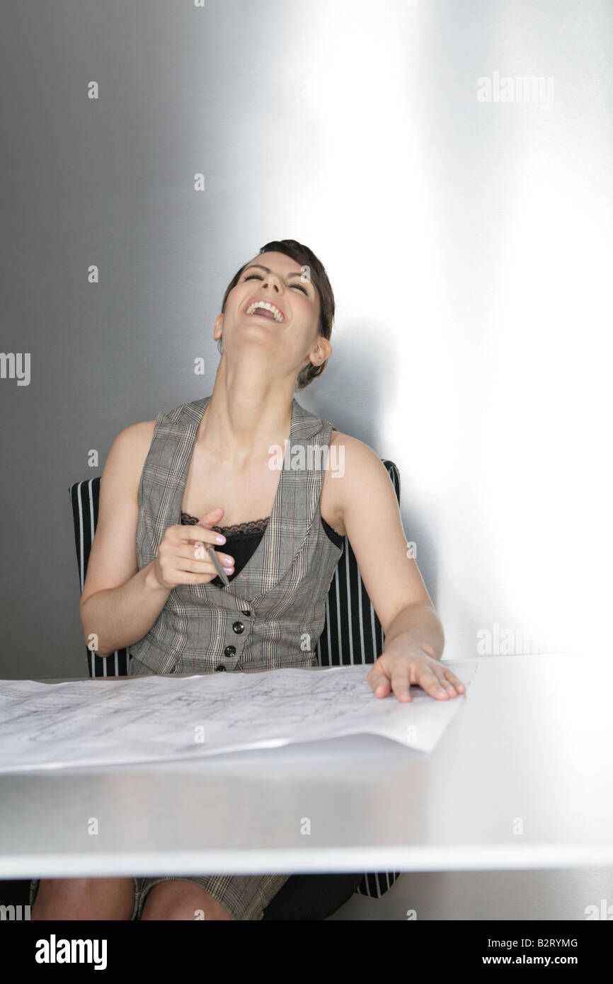 Businesswoman aged 24 laughing Stock Photo