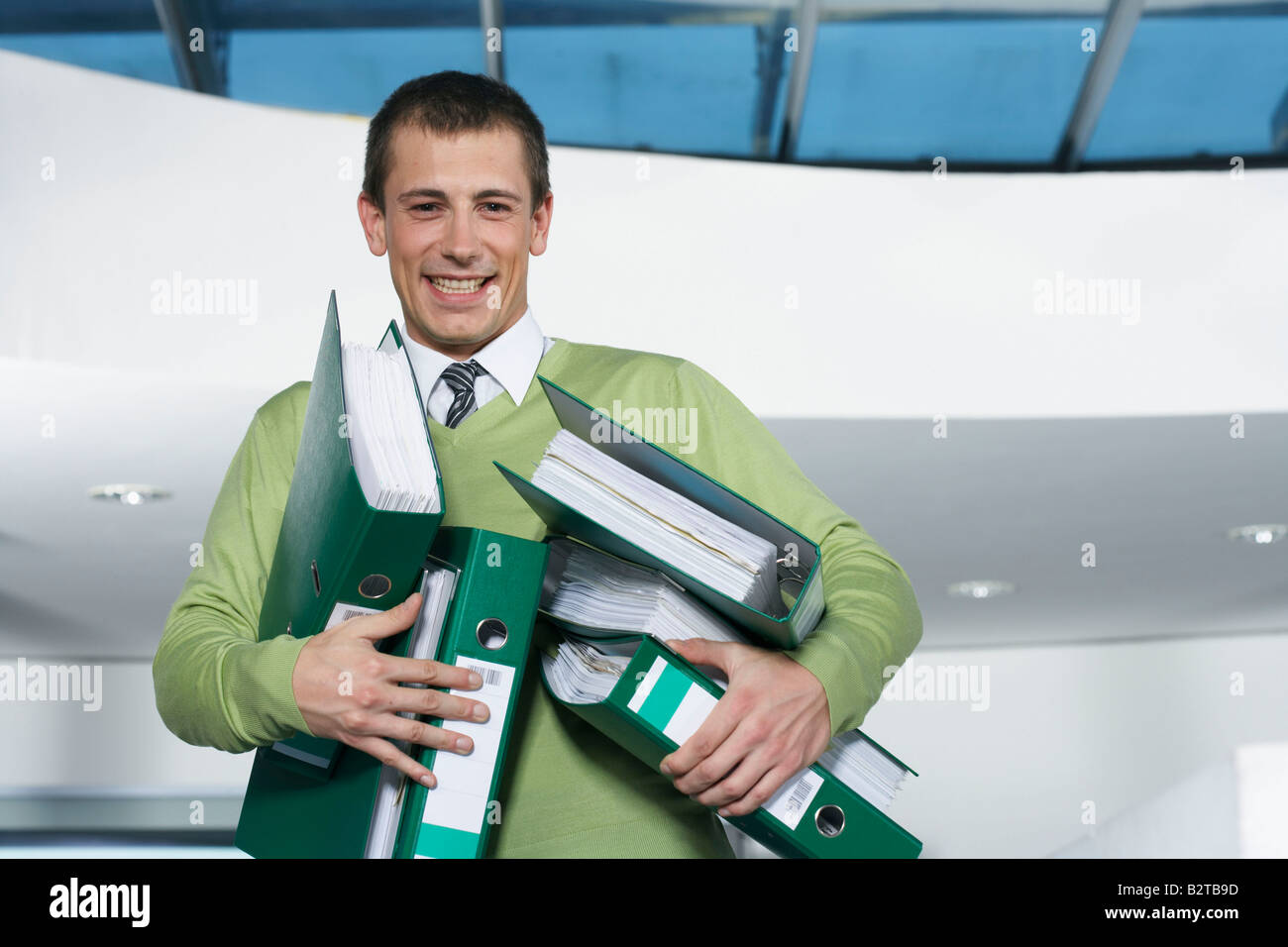 Man Collecting Doocument Image Man holding documents Stock Photo - Alamy