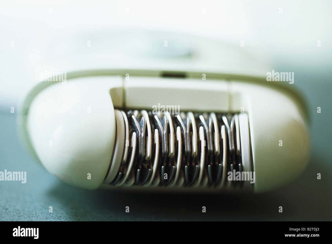 Electric epilator, closeup Stock Photo Alamy