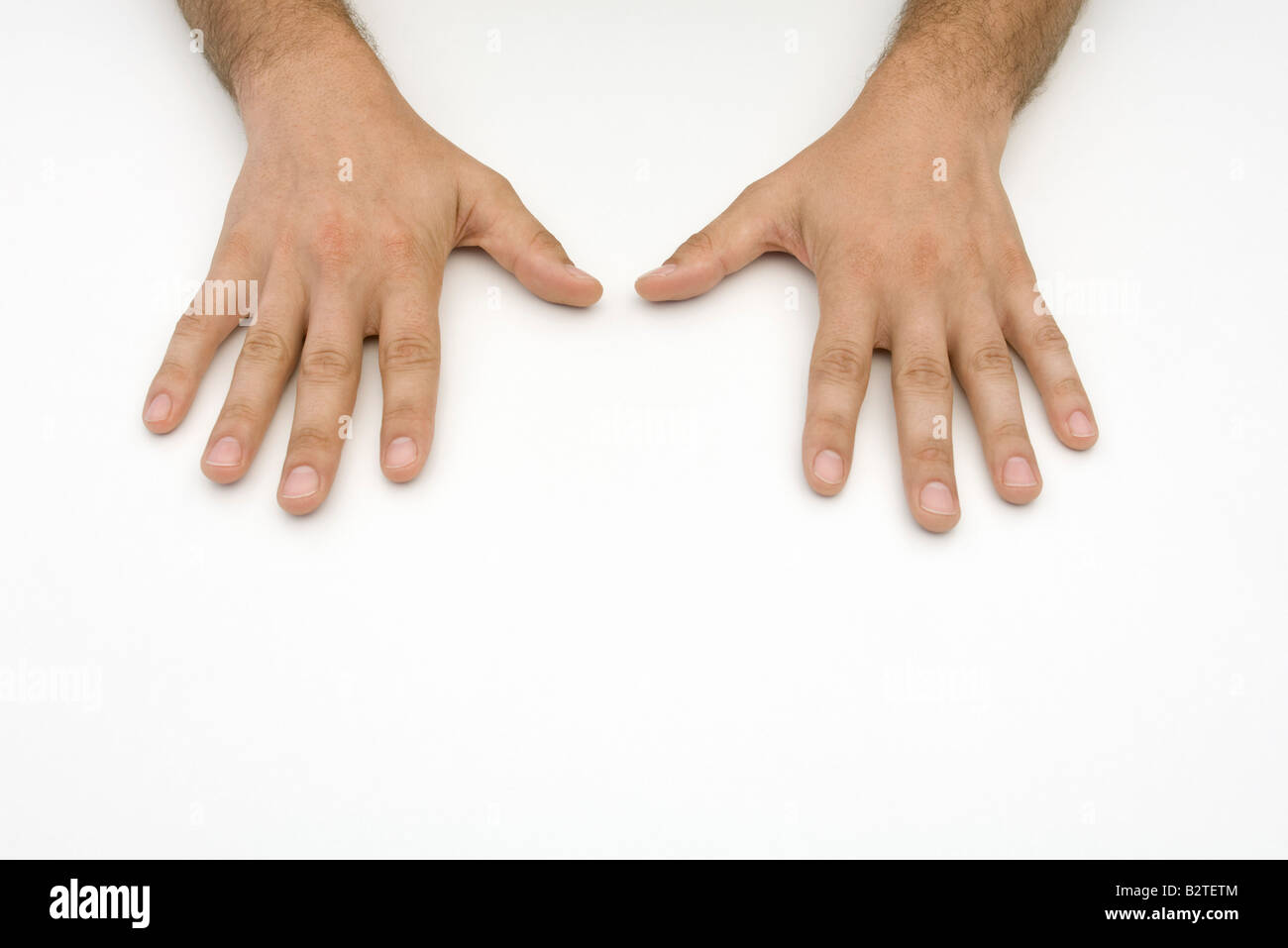 Man's hands, side by side Stock Photo