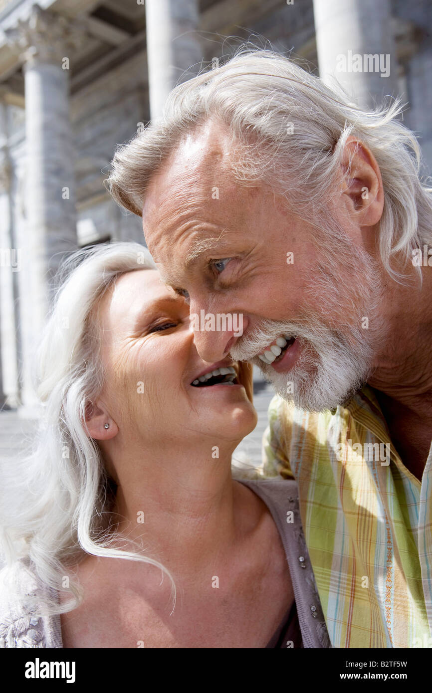 Woman kissing man Stock Photo - Alamy