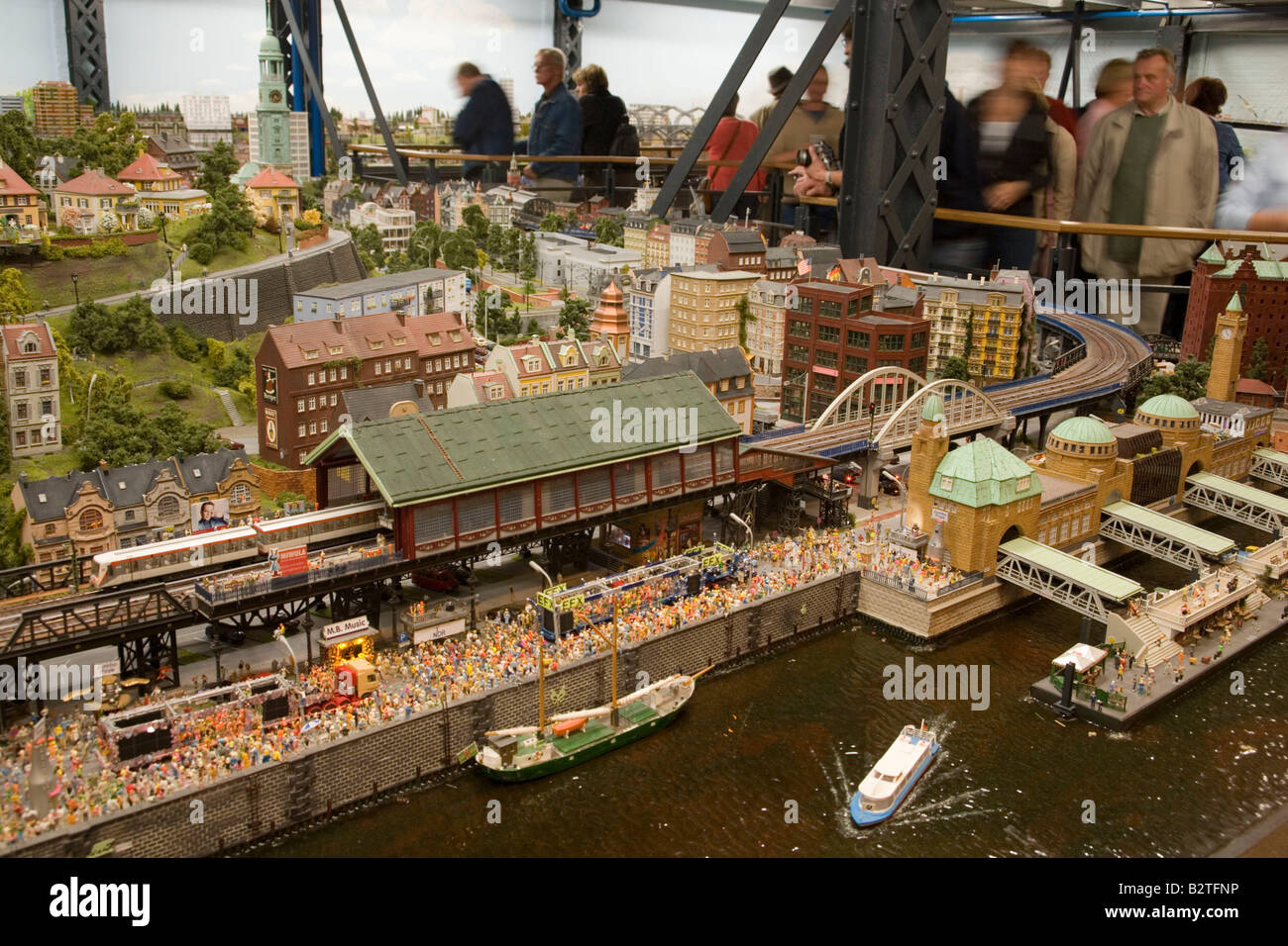 Visitors watching the model railroad, Visitors watching the largest model railroad in the world, the Miniatur Wunderland, Speich Stock Photo