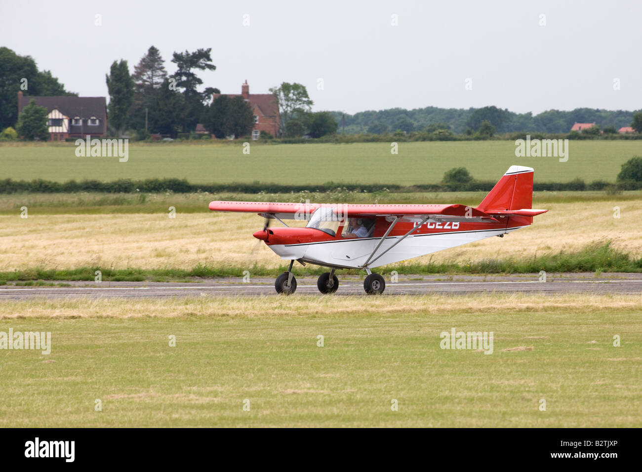 Savanah VG Sport Jabiru (1) G-CEZB microlight aircraft taxiing along runway at Wickenby Airfield Stock Photo