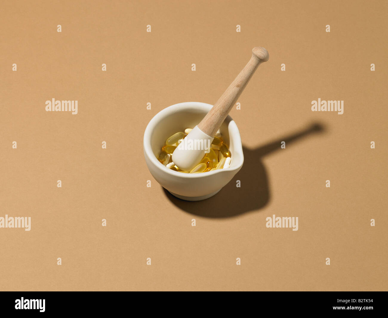 vitamin pills on oriental plate with chop sticks Stock Photo