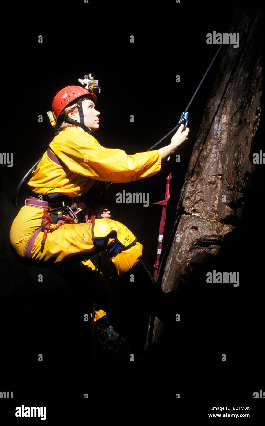 Caver ascending rope at Clearwater Cave Mulu Borneo Stock Photo