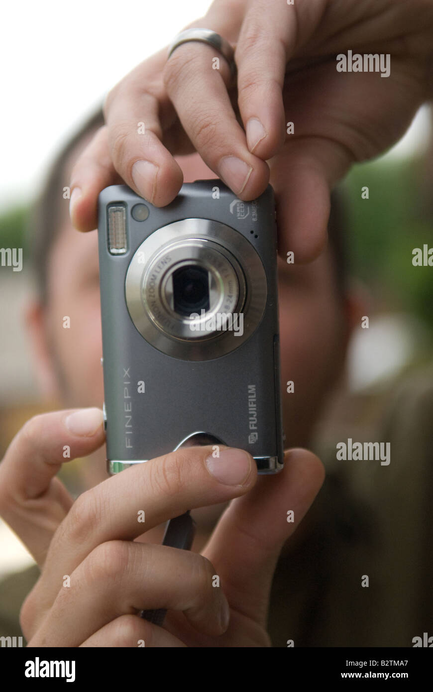 taking a photograph picture on digital camera Stock Photo Alamy